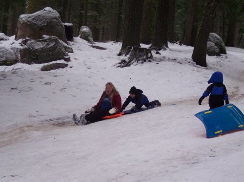 Jonny and sled at snow play area 