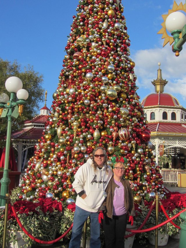 Dad and Missy by Christmas tree
