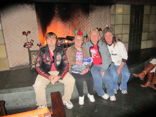 Family by fireplace at Grand Californian