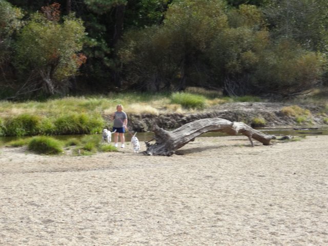 family by Merced river