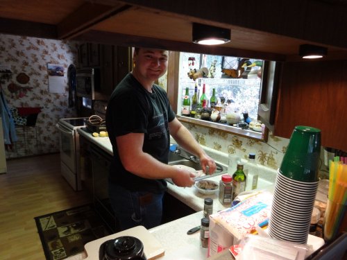 Jonny preparing Thanksgiving dinner