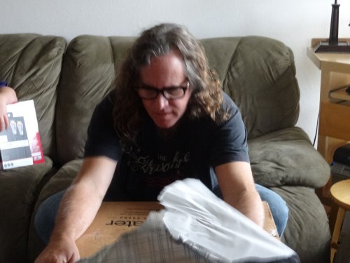 dad opening birthday presents