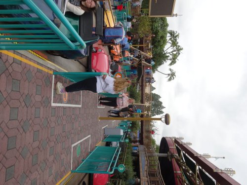 Mom and Missy waiting for their cars