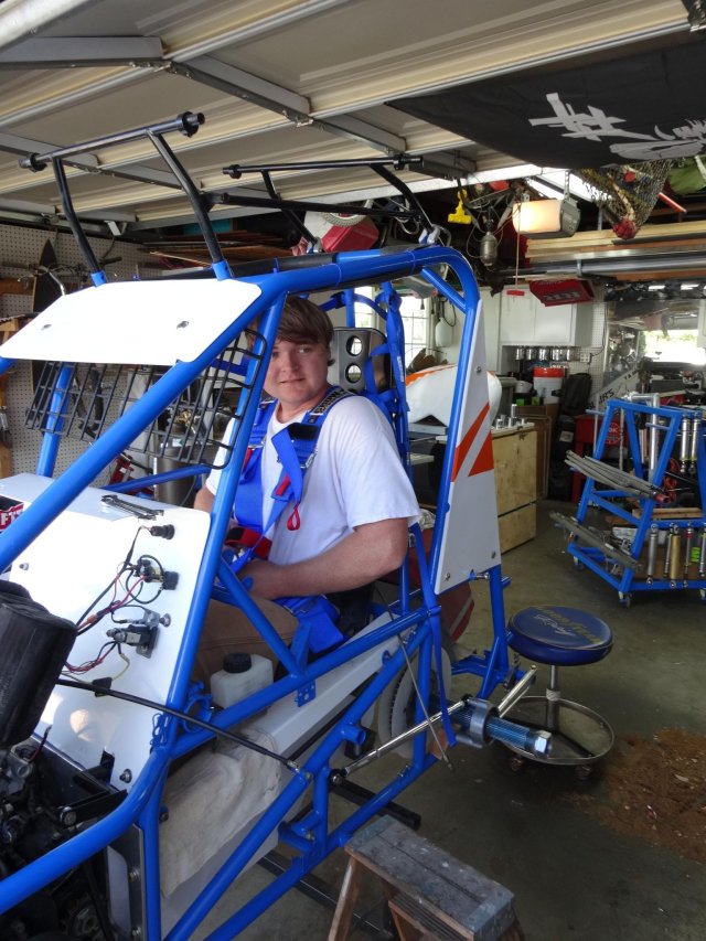 Jonny trying on the car