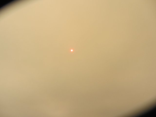Sun obscured by smoke