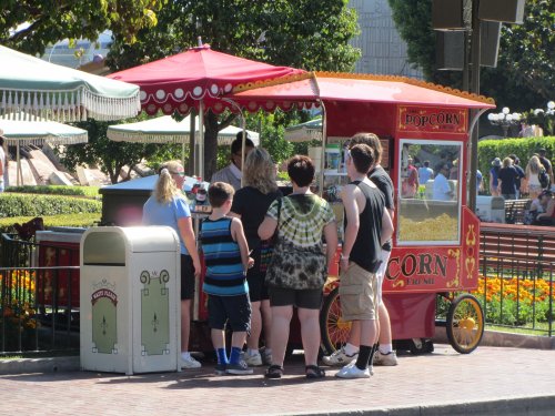 Family buying popcorn