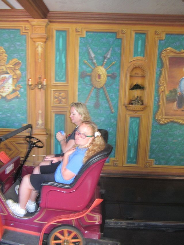 Missy and mom on Mr Toads Wild Ride
