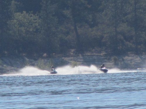 Family on watercraft at the lake