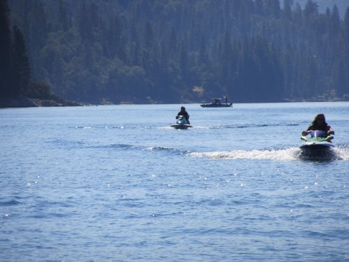 Family on watercraft at the lake