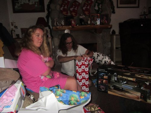 Missy and dad opening presents