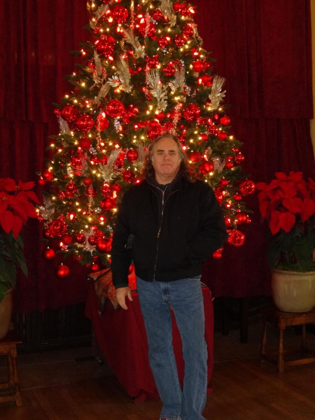 dad and Christmas tree