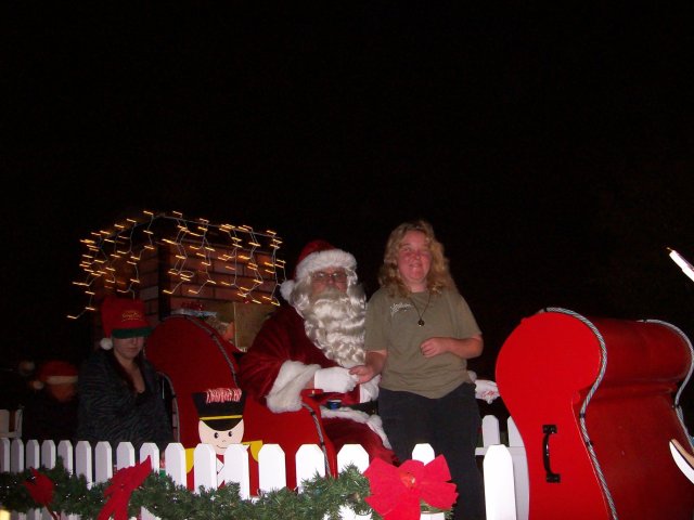 Melissa checking in with Santa Claus as he drove through the neighborhood 