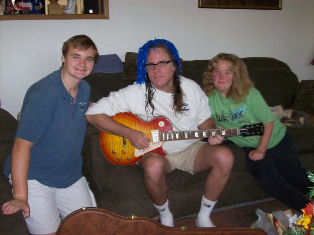 Kids & dad and new guitar on birthday 