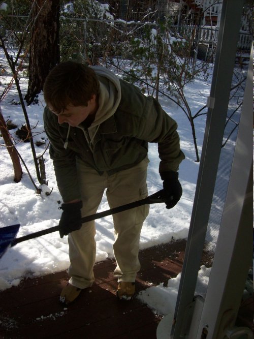 Jonny shoveling snow 