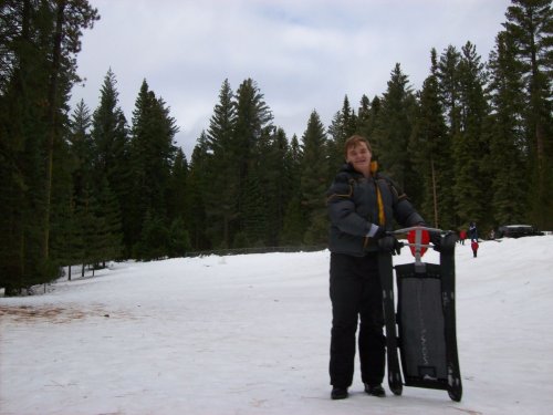 Jonny and sled at snow play area 