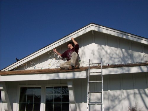 Jonny taking down Christmas lights 