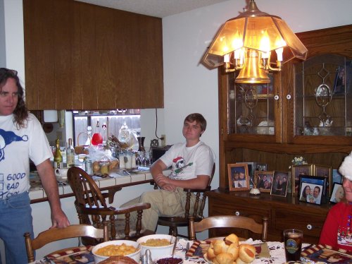 Jony overlooking the dinner table 