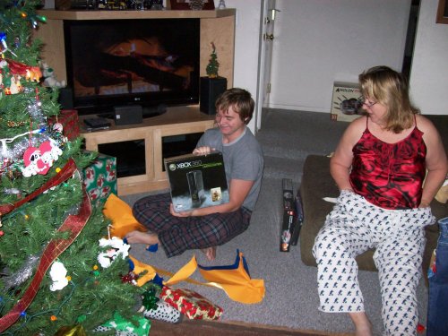 Jonny unwrapping his new X-Box 