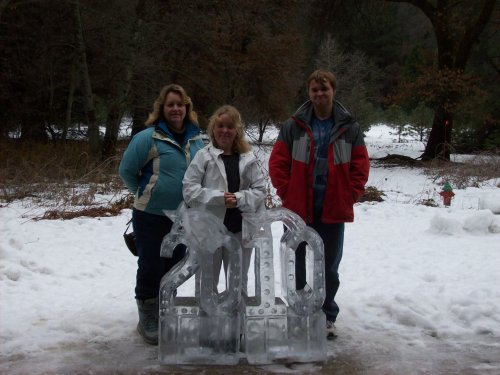 Mom and kids by ice sculpture at Ahwahnee 