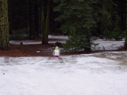 Lori seeing just how far she can sled 