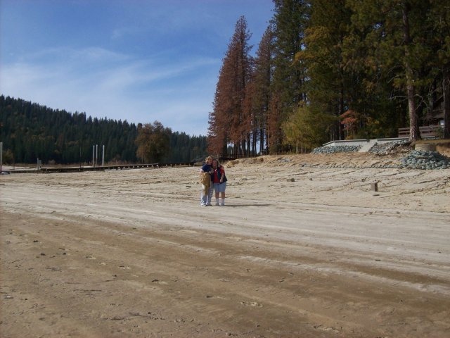 Mom & Missy walking on the beach 