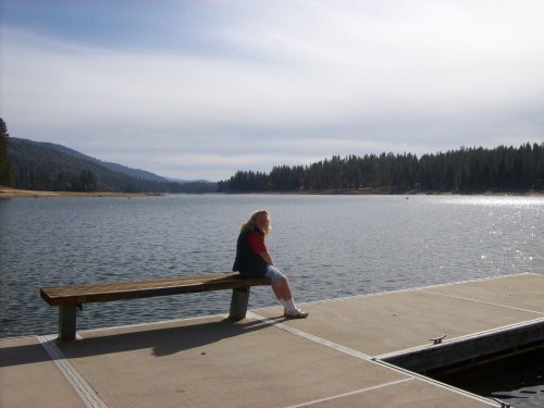 Melissa sitting on the dock 
