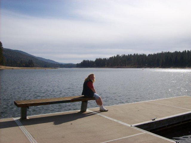 Melissa sitting on the dock 
