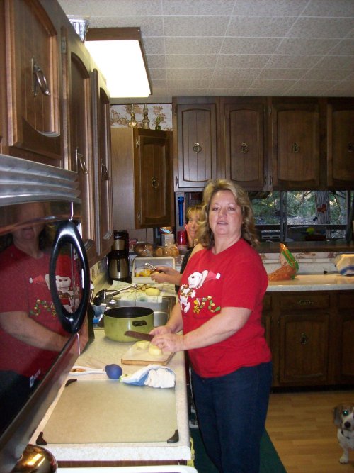 Mom and Melissa preparing Thanksgiving dinner 