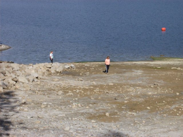 Missy and mom by the shore 