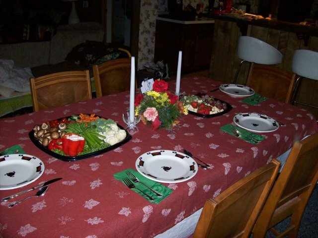 Table with vegetable and fruit trays 