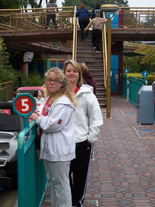 Melissa and mom waiting to for their car 