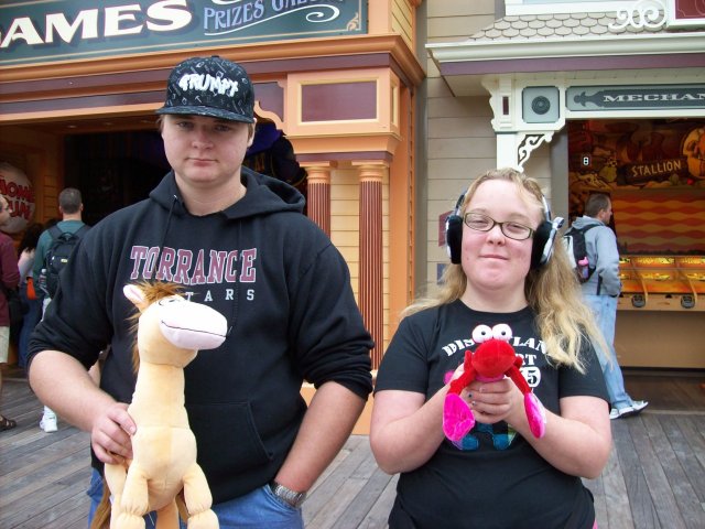 Jonny and Melissa showing of their prizes 