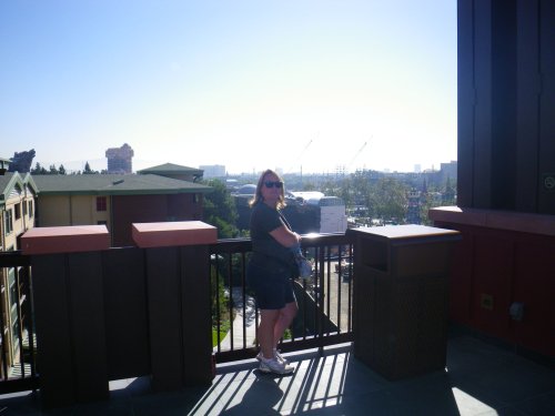 Lori on balcony overlooking California Adventure 