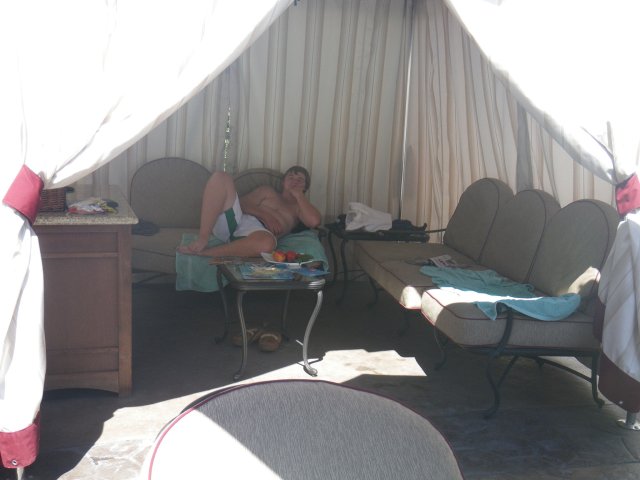 Jonny living the royal life in our cabana 