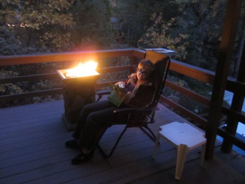 Melissa and her IPAD on the deck 