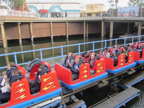 Dad and kids on roller coaster
