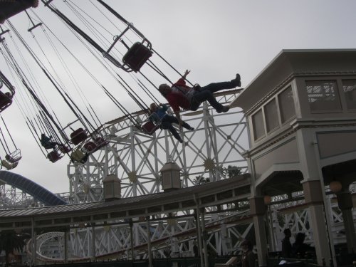 Dad and Missy on swings