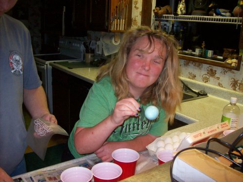 Kids coloring easter eggs 