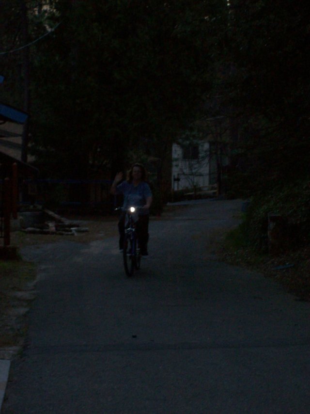 Mom riding new bicycle 