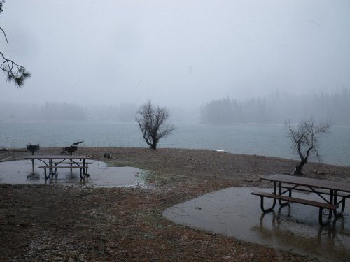 Snowstorm crossing the lake 