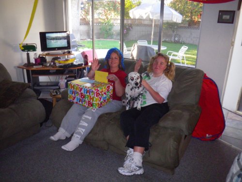 Lori opening presents on her birthday 