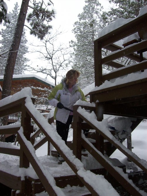 Lori shoveling snow 