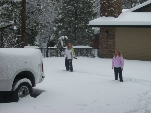 mom and Melissa playing in the snow 