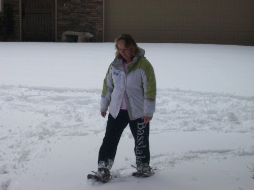 Lori trying out snowshoes 
