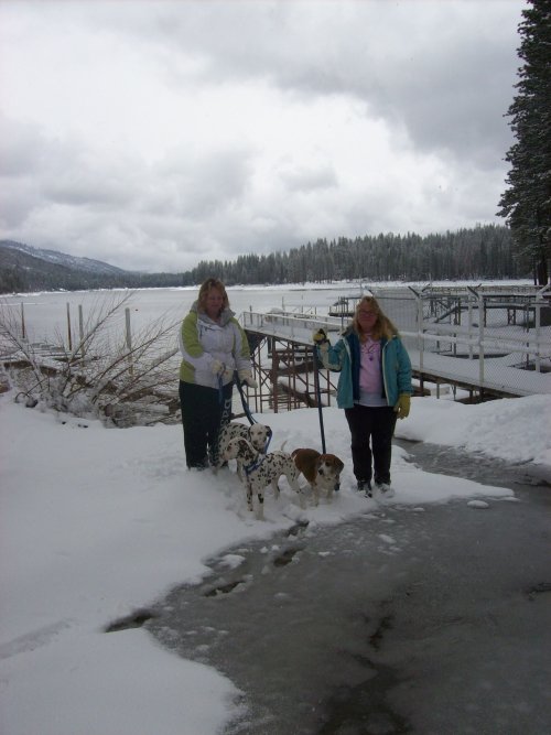 Mom, Melissa and dogs by the lake 