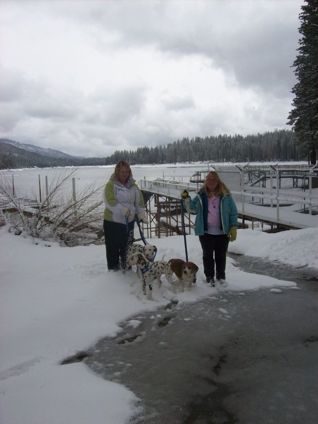 Mom, Melissa and dogs by the lake 