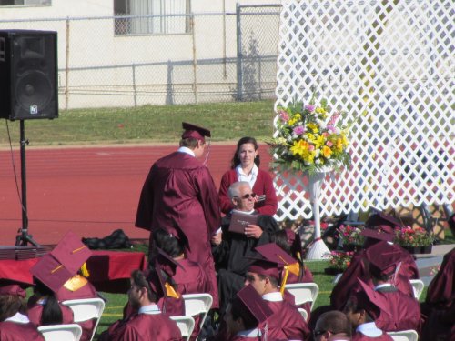 Jonny receiving his diploma 