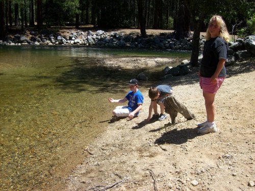 Kids skipping stones 