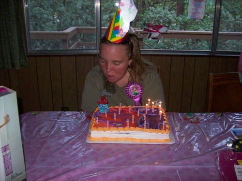 Melissa blowing out candles 