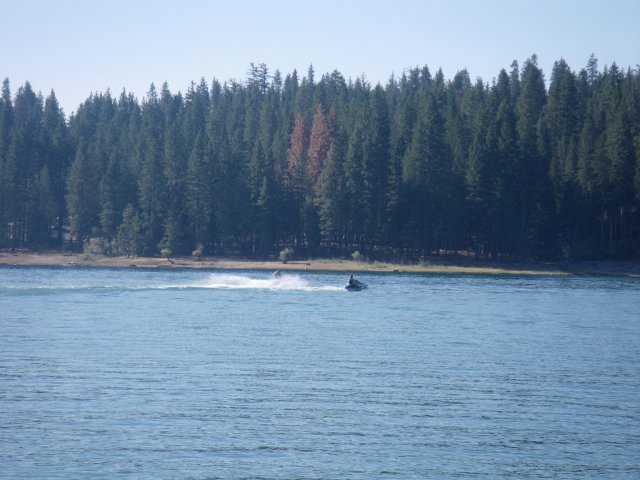 Family heading across the lake 